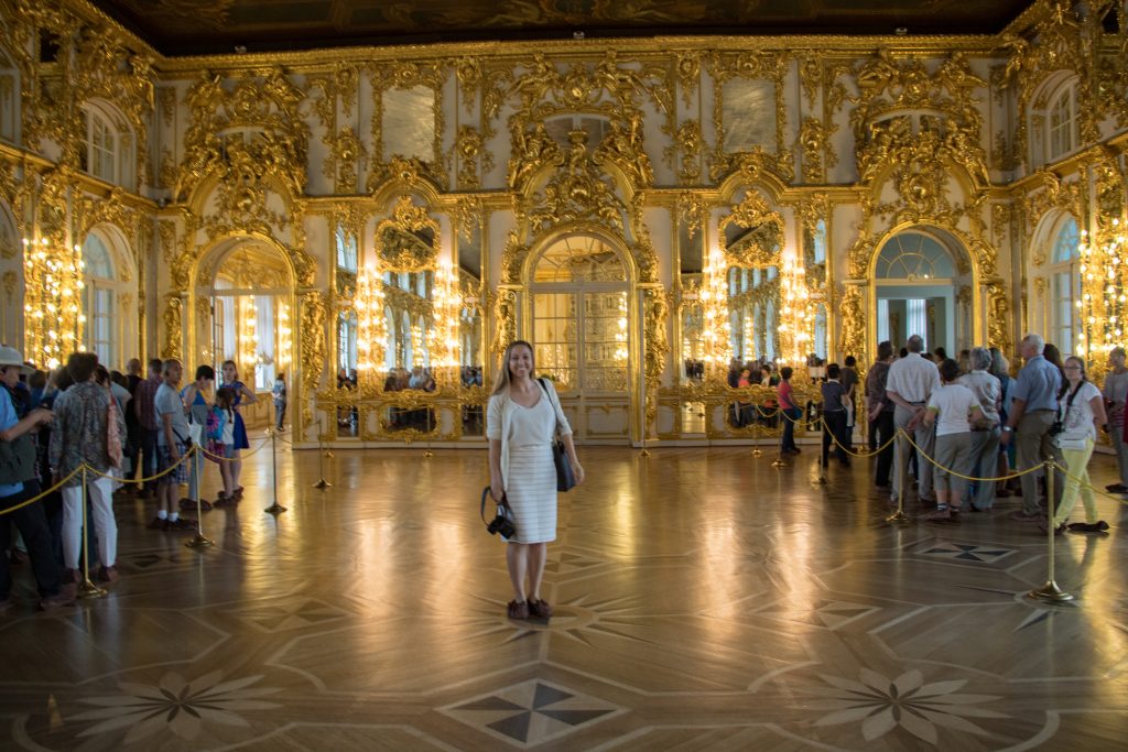 woman standing for a photo in St. Petersburg palace