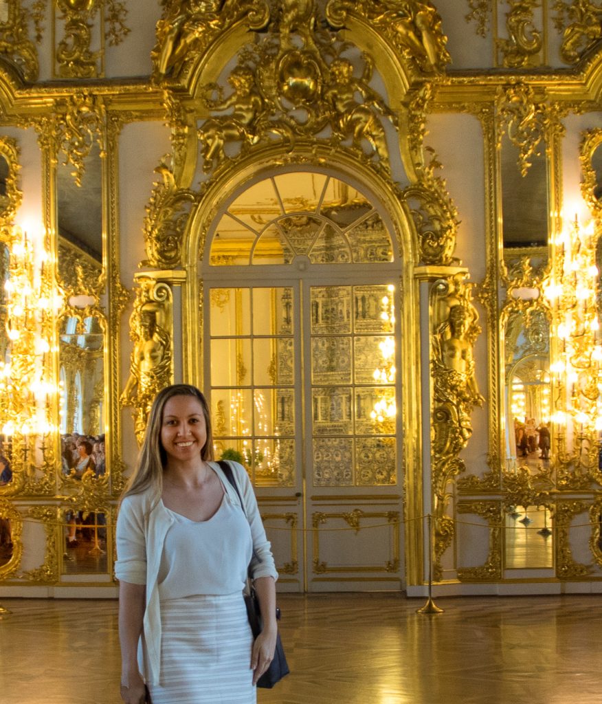 woman standing for a photo in St. Petersburg palace